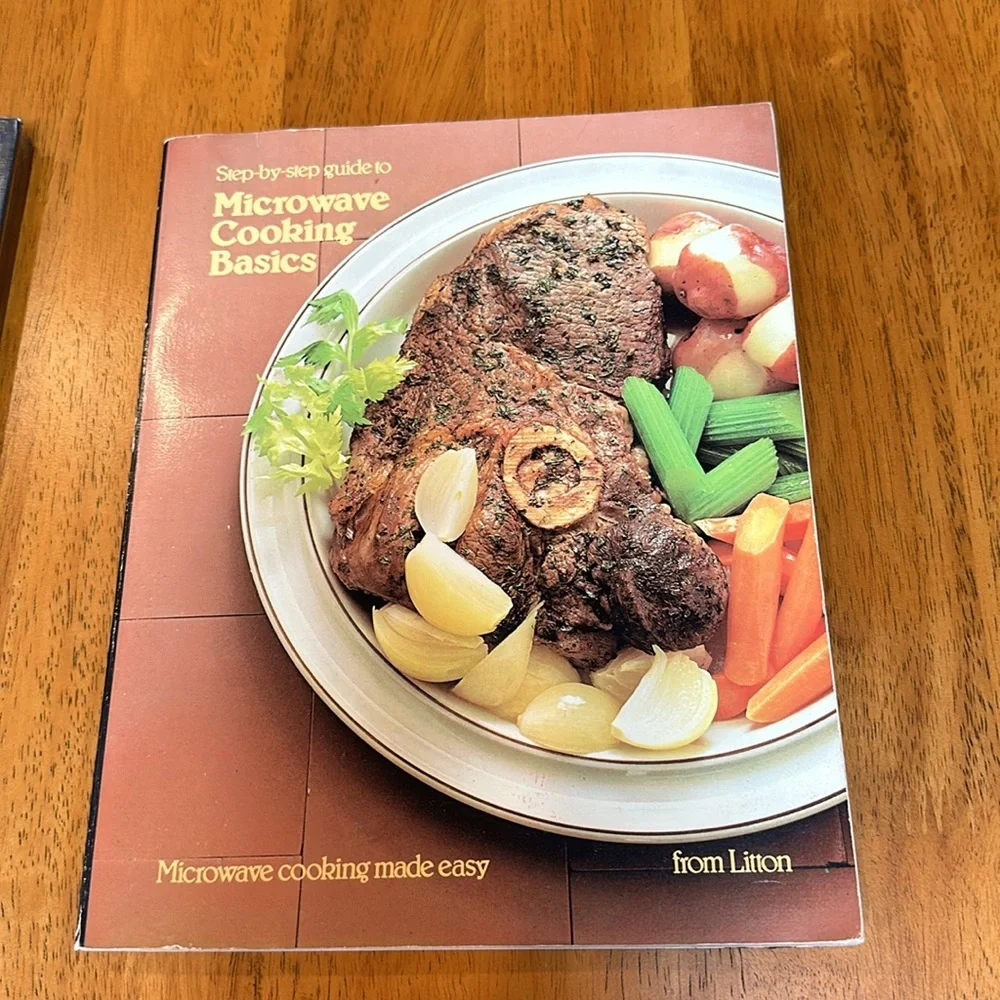 2- Microwave cookbooks. One is still in plastic by Whirlpool. The other Litton